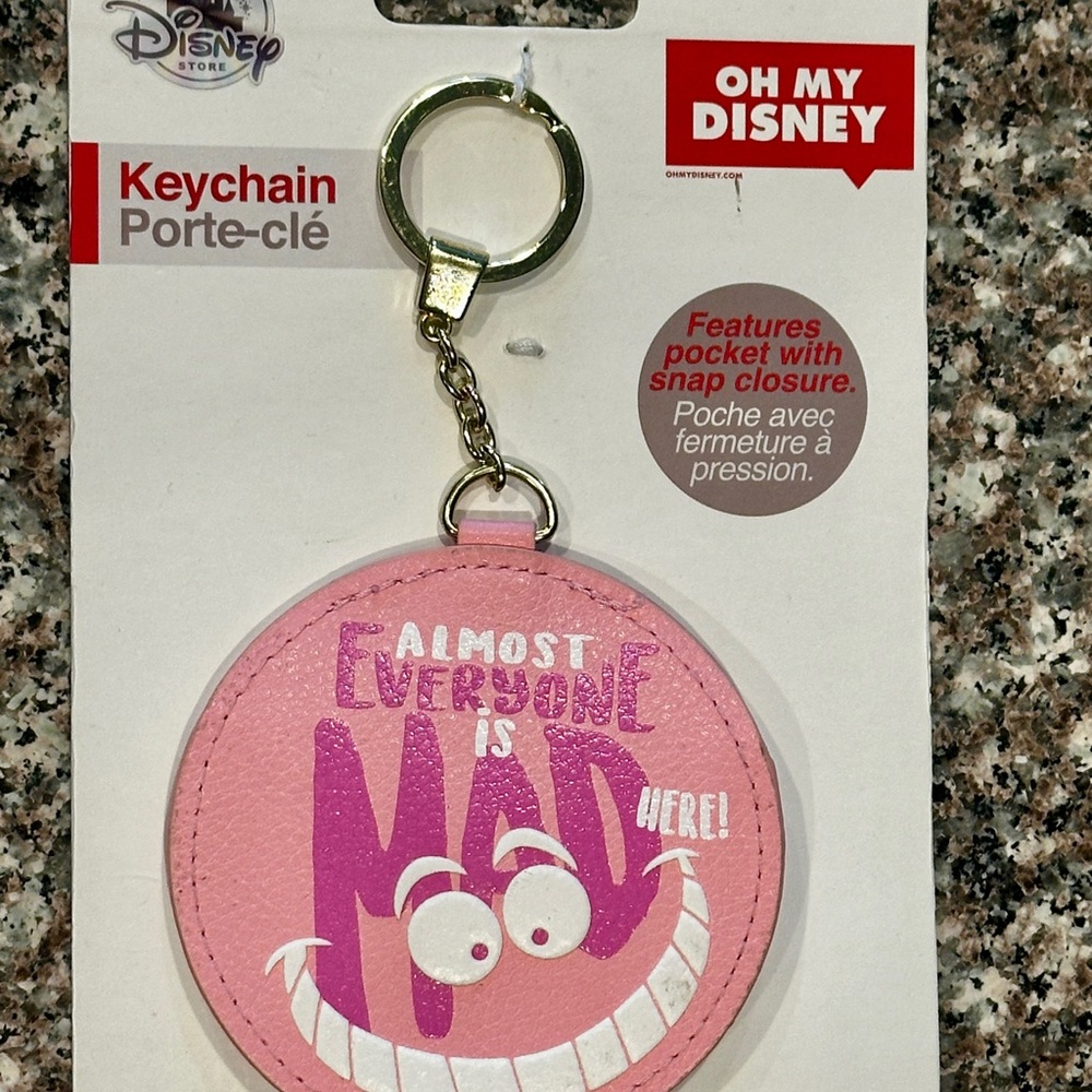 Disney Pink & White, Oh My Disney “Almost Everyone is Mad Here!” Pocket Keychain